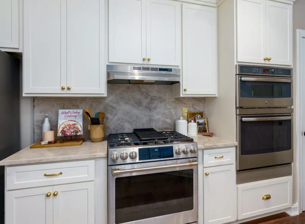 Kitchen cabinets with professional spray finish and built-in appliances