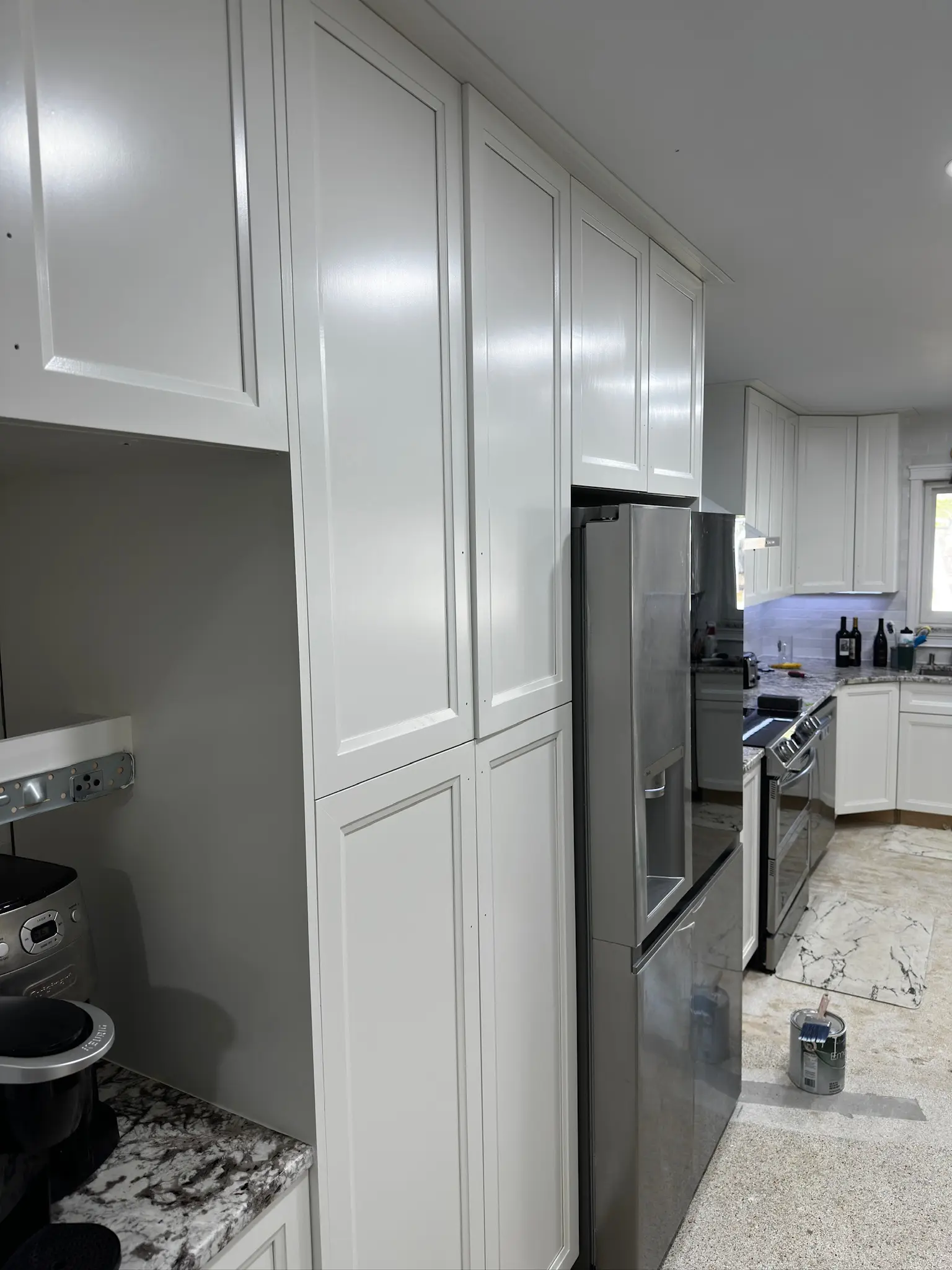 White cabinet doors and drawers with factory-like spray finish