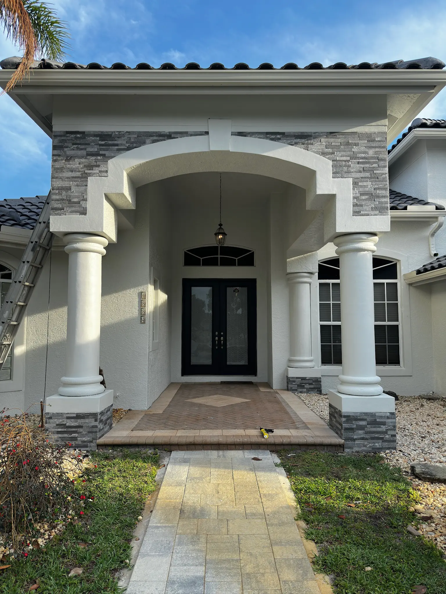 Front entry exterior painting with detailed trim and clean lines